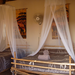 Inside the hut. It has a self-catering kitchen and toilet and shower. There is electricity but no TV. Animals run wild, and it is not uncommon the see impala grazing in the front yard. It is very peaceful there.