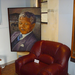 Mandela's chair and painting given to him. Other artifacts in the enclosed case include boxing gloves given to him by Sugar Ray Leonard.
