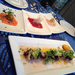 sashimi on top octopus on the bottom