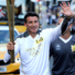 Sebastian Coe, who was head of the bid for London to host the 2012 Olympics, takes his turn with the Torch. Picture: LOCOG