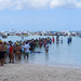 Lines of people and boats