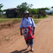 Wearing a traditional Swazi cloth (Emahiya) to cover my pants (required) in preparation for a visit to an Umphakatsi Chief (Swasi) Homestead.