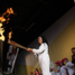 Laura McCann lights the Beacon with the Olympic Flame at the end of Day 19 of the Torch Relay leg in Belfast.
