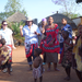 Singing a tribal sone and dancing with the chief's daughter and children.