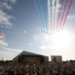 The Red Arrows trail the red, white and blue as they complete a fly-by over Yarborough Sports Ground. Picture: LOCOG