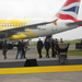Olympic torch - Nick Clegg and other dignitaries greeting the plane.jpg