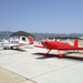 An older Mooney (background) and an experimental kit plane (foreground)
