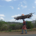Swasi woman multi-tasking.