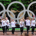 Primary school children celebrate the unveiling of a giant set of Olympic rings in Glasgow.