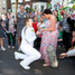 Torchbearer David State pauses on his leg of the relay to propose to girlfriend Christine. She said yes! Picture: LOCOG